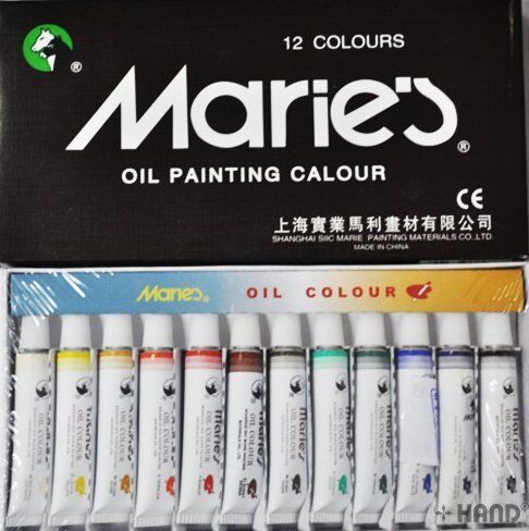 Set of 12 Marie's fine oil colours displayed in their packaging.