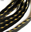 Black sew in pipe trim with black and gold edge on a roll