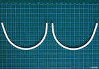 Close-up of plastic bra under wire showing flexibility.