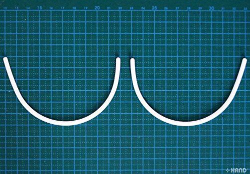 Close-up of plastic bra under wire showing flexibility.