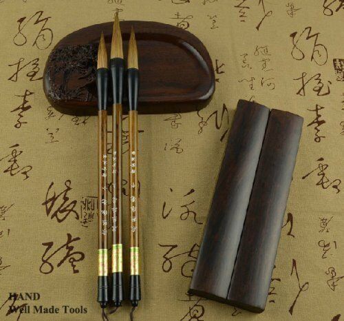 Close-up of the brush tips showing fine bristles for calligraphy.