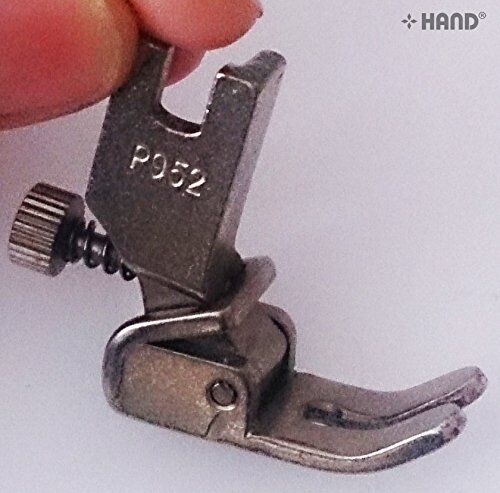 Close-up of the adjustable screw on the gathering foot