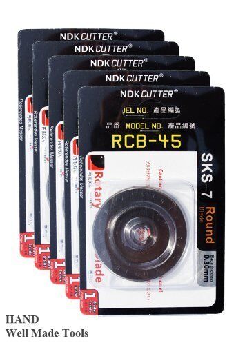 Five 45mm rotary cutter blades displayed in packaging