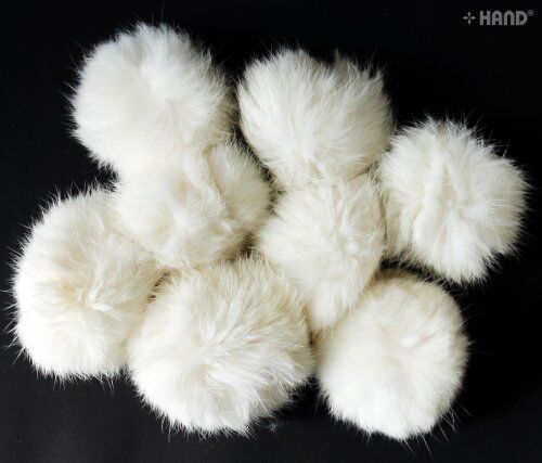 Pack of 8 white decorative rabbit bobble ball trims displayed together.
