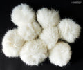 Pack of 8 white decorative rabbit bobble ball trims displayed together.