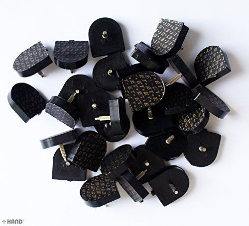 Close-up of U-shape high shoe repair heel tips in black.