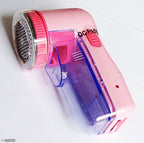Close-up of the Bobble Off Lint Remover's blade in action