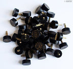 Close-up of 15mm heel tips for shoe repair.