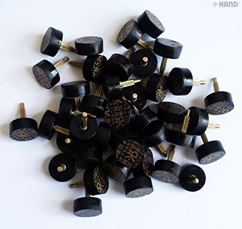 Close-up of 15mm heel tips for shoe repair.