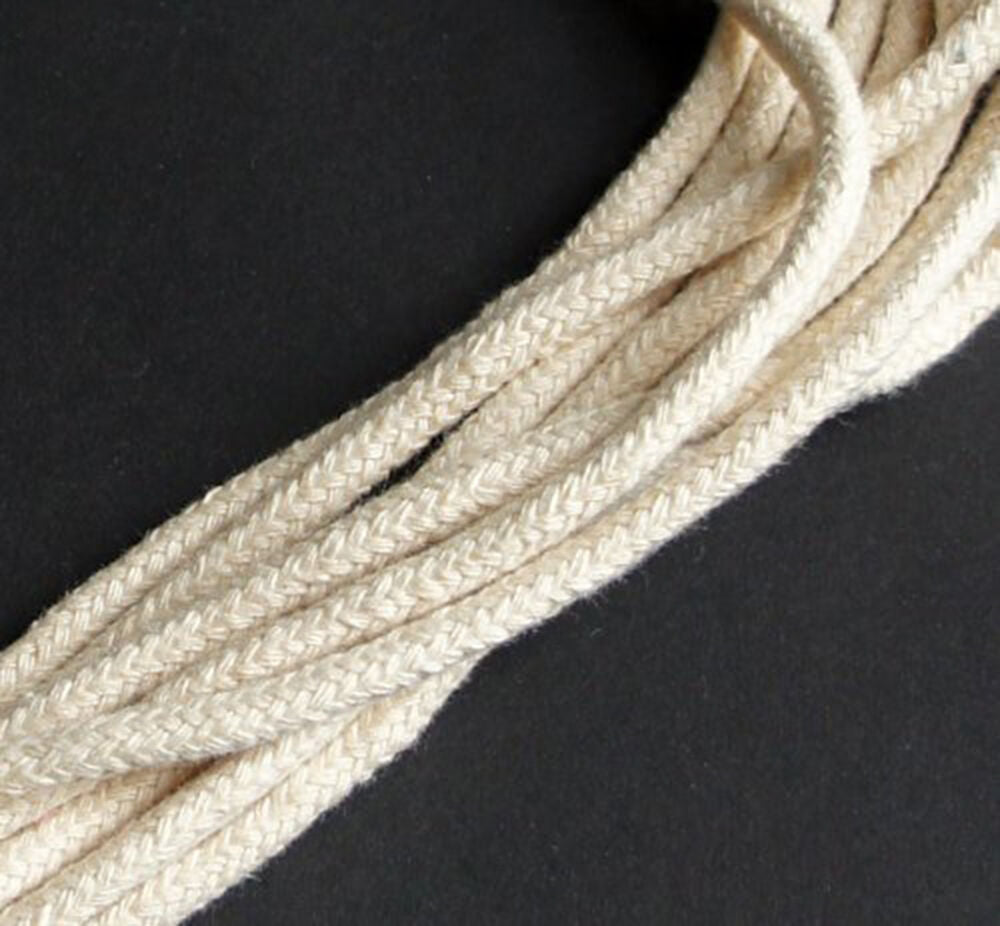 Roll of cream thick string rope cord with measuring tape