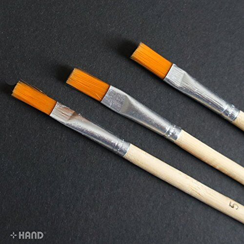 Flat brushes in various sizes for versatile painting