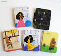 Two cute children's cartoon folding notebook mirrors with combs.
