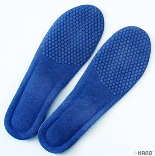Men's gel insoles placed inside a pair of shoes.