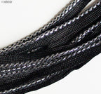 Close-up of black pipe trim showcasing silver edge detail