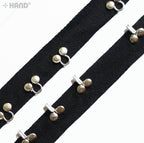 Full view of 2 metres of HE10 decorative silver hooks and eyes tape