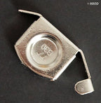 Magnetic seam guide in use with fabric on sewing machine