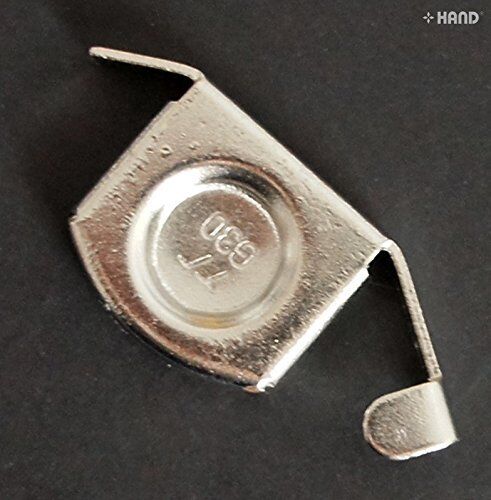 Magnetic seam guide in use with fabric on sewing machine