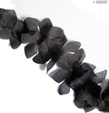 Black decorative leaves nylon trim displayed on a white background