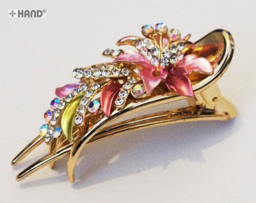Two elegant hair clips with shiny flower design on a white background.