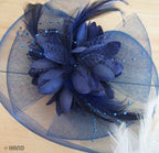 Metal clip detail on a lace headdress accessory