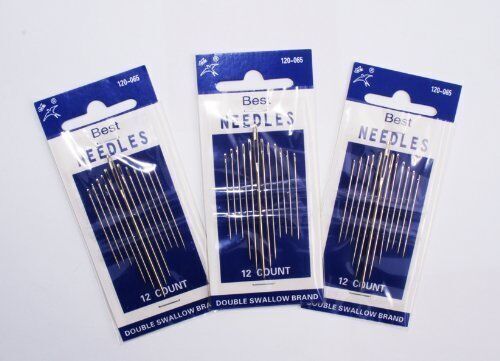 Close-up of nickel plated steel sewing needles with sharp points.