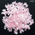 Various angles of pink ribbon bows in the pack