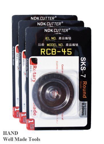Three 45mm rotary cutter blades displayed on a white background.