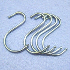 Close-up of a stainless steel S hook showing its sturdy design.