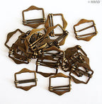 Assorted sizes of antique gold metal buckles