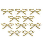 Gold colour ribbon bow pendant on a white background.