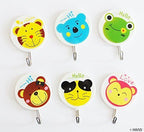 Self-adhesive hooks in use, holding children's accessories