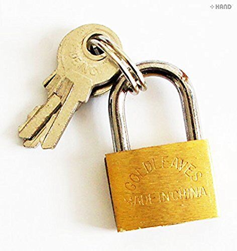 Four small brass luggage padlocks in a row
