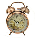 Vintage Roman Colosseum alarm clock in copper tone finish.
