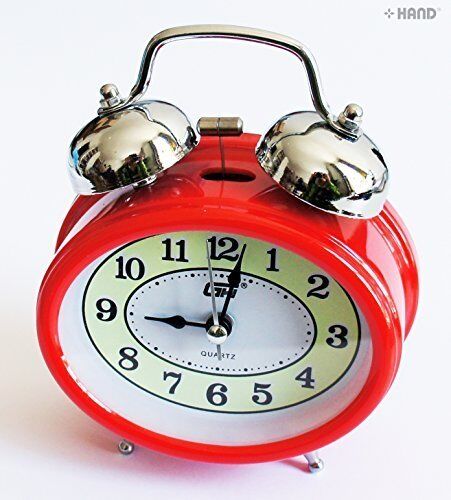 Close-up of the metal twin bell mechanism of the alarm clock