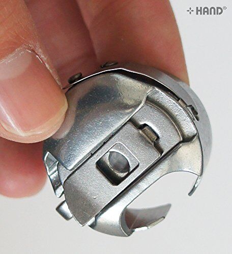 Close-up of the Towa bobbin case's long wide shape