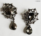 Elegant stone brooch displayed on a neutral background