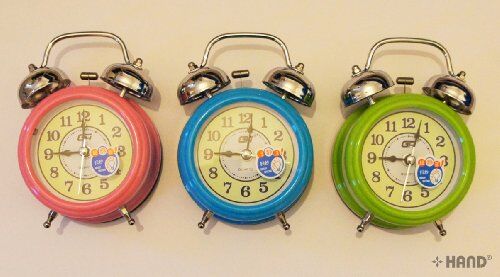 Side profile of the twin bell alarm clock showing its design