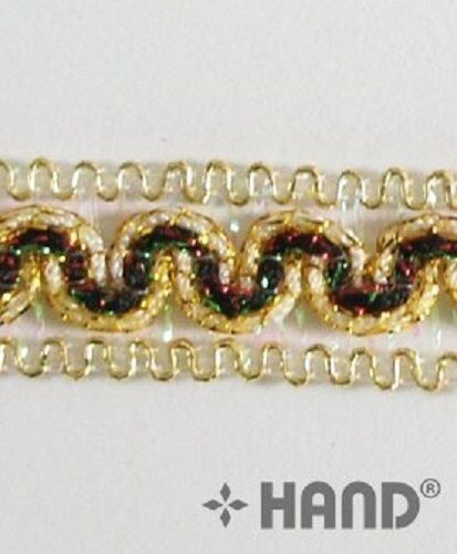 Close-up of the decorative gold trim ribbon's intricate design.
