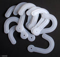 Three-inch white plastic hanger for fabric samples.