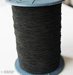 Black shirring elastic used in a sewing project for gathering