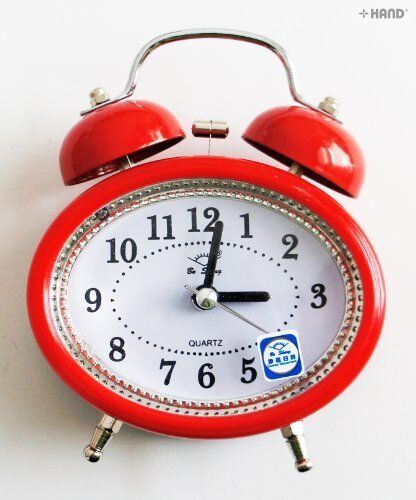 Back view of the alarm clock displaying the quartz movement