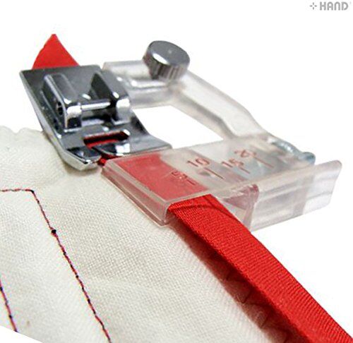 Close-up of the bias binder presser foot showing its adjustable feature