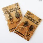 Vintage gold bookmarks resting on an open book