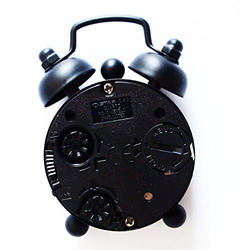 Mini white silent metal twin bell alarm clock featuring a mustache.
