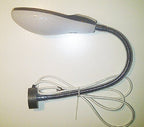 Sewing machine with the gooseneck lamp attached