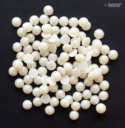 Pack of pearl round hotfix rhinestone gems in assorted sizes.