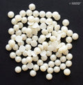 Pack of pearl round hotfix rhinestone gems in assorted sizes.