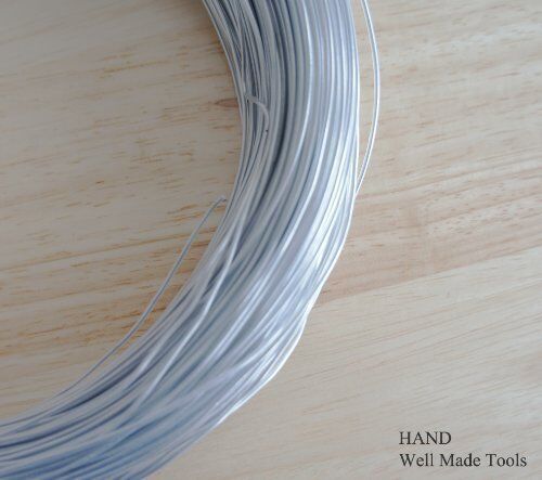 Close-up of finger friendly toner craft wire showing its smooth finish.