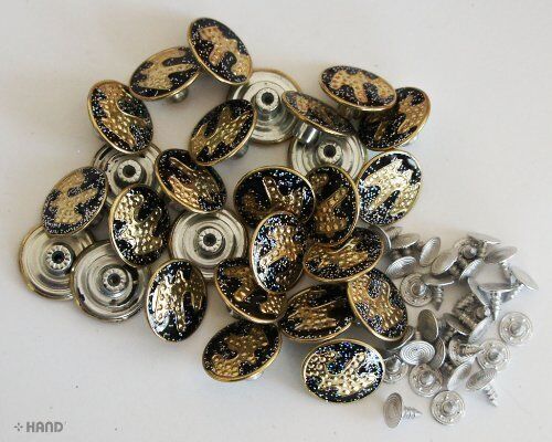 Close-up of fashionable jeans buttons with glitters