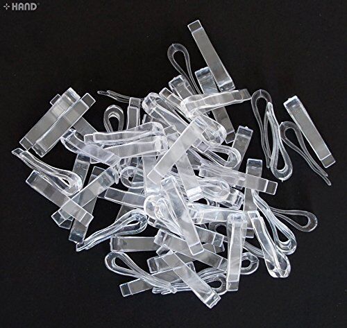 Close-up of a large plastic garment shirt clip.